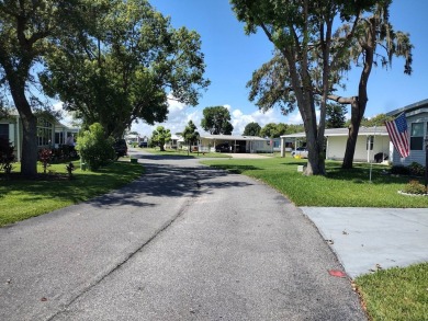 HOME FEATURES;  This open floor plan with cathedral ceilings on Lakes at Leesburg Golf Course in Florida - for sale on GolfHomes.com, golf home, golf lot