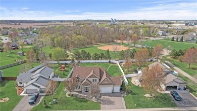 Welcome to 10416 62nd St NE, a thoughtfully designed 6-bedroom on Cedar Creek Golf Course in Minnesota - for sale on GolfHomes.com, golf home, golf lot