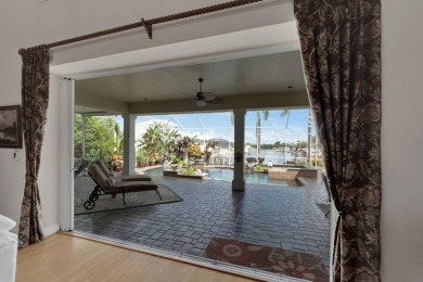 517 MiraBay Blvd | 4 Beds | 4 Baths | 4,089 Sq Ft | Waterfront on Apollo Beach Golf and Sea Club in Florida - for sale on GolfHomes.com, golf home, golf lot