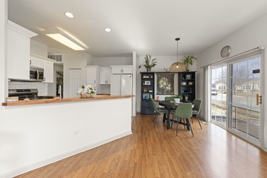 Move-in ready and beautifully updated Whitney Ranch Quad in on Carillon Lakes 3 Hole Course in Illinois - for sale on GolfHomes.com, golf home, golf lot