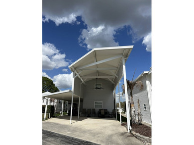 Custom designed with RV hookups 34X28 upstairs for 2 bedrooms on Deer Creek RV Golf Resort in Florida - for sale on GolfHomes.com, golf home, golf lot