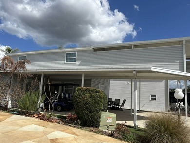 Custom designed with RV hookups 34X28 upstairs for 2 bedrooms on Deer Creek RV Golf Resort in Florida - for sale on GolfHomes.com, golf home, golf lot