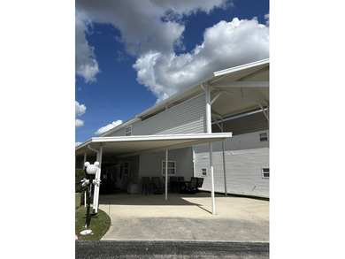 Custom designed with RV hookups 34X28 upstairs for 2 bedrooms on Deer Creek RV Golf Resort in Florida - for sale on GolfHomes.com, golf home, golf lot