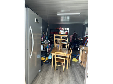 Custom designed with RV hookups 34X28 upstairs for 2 bedrooms on Deer Creek RV Golf Resort in Florida - for sale on GolfHomes.com, golf home, golf lot