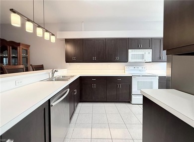 End unit 2 Bedroom + Den Condo - Highly sought after floor plan on Naples Heritage Golf and Country Club in Florida - for sale on GolfHomes.com, golf home, golf lot