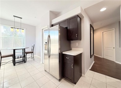 End unit 2 Bedroom + Den Condo - Highly sought after floor plan on Naples Heritage Golf and Country Club in Florida - for sale on GolfHomes.com, golf home, golf lot