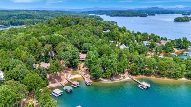 KEOWEE KEY LAKEFRONT HOME ON LEVEL LOT & BEACH! COVERED DOCK IN on Keowee Key Golf and Country Club in South Carolina - for sale on GolfHomes.com, golf home, golf lot