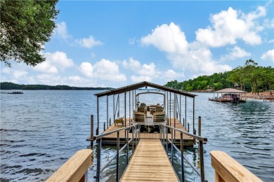 KEOWEE KEY LAKEFRONT HOME ON LEVEL LOT & BEACH! COVERED DOCK IN on Keowee Key Golf and Country Club in South Carolina - for sale on GolfHomes.com, golf home, golf lot