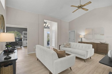 Gorgeous, Model-Perfect 3BR/2BA plus Den home on a Private on Peridia Golf and Country Club in Florida - for sale on GolfHomes.com, golf home, golf lot