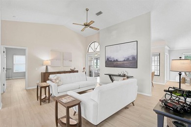 Gorgeous, Model-Perfect 3BR/2BA plus Den home on a Private on Peridia Golf and Country Club in Florida - for sale on GolfHomes.com, golf home, golf lot