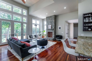 A spacious contemporary located in a resort quality setting on The Club at River Oaks in Connecticut - for sale on GolfHomes.com, golf home, golf lot