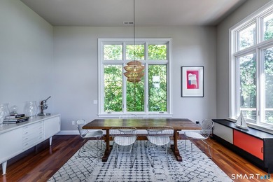 A spacious contemporary located in a resort quality setting on The Club at River Oaks in Connecticut - for sale on GolfHomes.com, golf home, golf lot