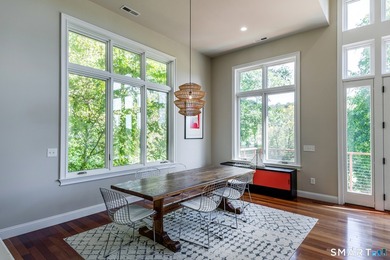 A spacious contemporary located in a resort quality setting on The Club at River Oaks in Connecticut - for sale on GolfHomes.com, golf home, golf lot