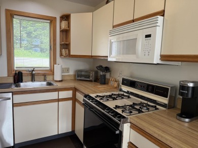 Enjoy Green Mountain views from this bright and spacious on Hermitage Club Golf Course in Vermont - for sale on GolfHomes.com, golf home, golf lot