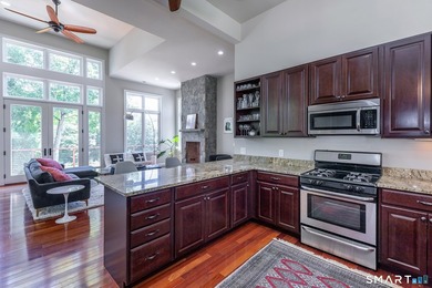 A spacious contemporary located in a resort quality setting on The Club at River Oaks in Connecticut - for sale on GolfHomes.com, golf home, golf lot