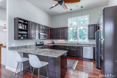 A spacious contemporary located in a resort quality setting on The Club at River Oaks in Connecticut - for sale on GolfHomes.com, golf home, golf lot