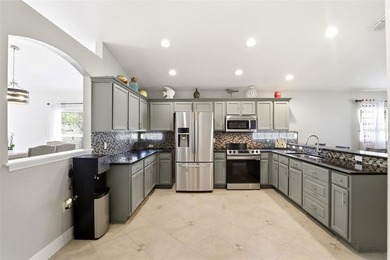 Welcome to this lovely home in the highly sought-after Remington on Remington Golf Club in Florida - for sale on GolfHomes.com, golf home, golf lot