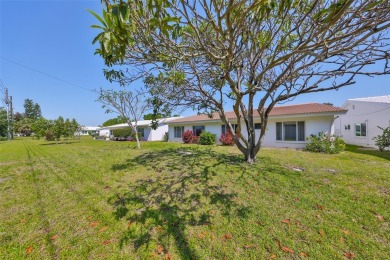 PRICED WELL UNDER APPRAISAL!  Welcome to the vibrant senior on Mainlands Golf Club in Florida - for sale on GolfHomes.com, golf home, golf lot