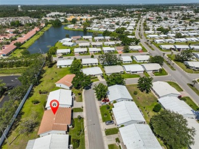 PRICED WELL UNDER APPRAISAL!  Welcome to the vibrant senior on Mainlands Golf Club in Florida - for sale on GolfHomes.com, golf home, golf lot