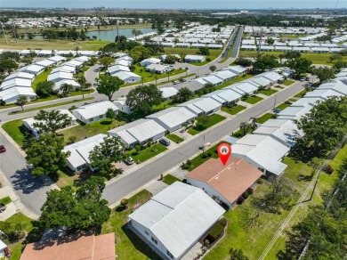 PRICED WELL UNDER APPRAISAL!  Welcome to the vibrant senior on Mainlands Golf Club in Florida - for sale on GolfHomes.com, golf home, golf lot