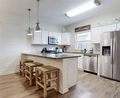 Beach life just got easier at popular Beachside Townhomes-2 on Palmilla Beach Golf Club in Texas - for sale on GolfHomes.com, golf home, golf lot