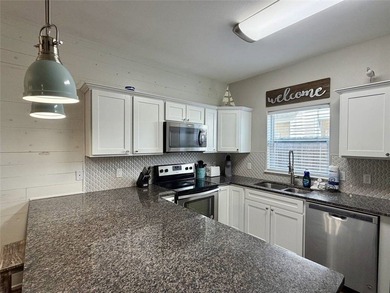 Beach life just got easier at popular Beachside Townhomes-2 on Palmilla Beach Golf Club in Texas - for sale on GolfHomes.com, golf home, golf lot