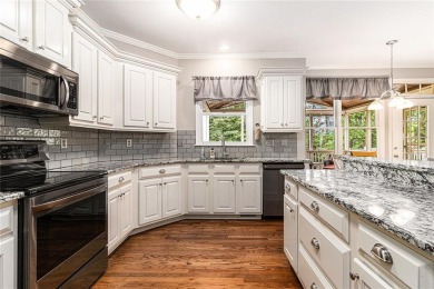 Welcome to your dream home in the prestigious Woodmont Golf and on Woodmont Golf and Country Club in Georgia - for sale on GolfHomes.com, golf home, golf lot