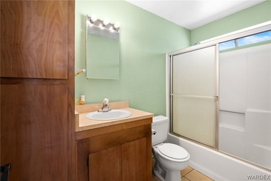 Charming golf course home located on the 15th hole of Valle on Valle Vista Golf Course in Arizona - for sale on GolfHomes.com, golf home, golf lot