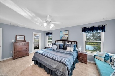 Stunningly Updated 4-Bedroom, 2-Bathroom WATERFRONT home located on Del Tura Golf and Country Club in Florida - for sale on GolfHomes.com, golf home, golf lot