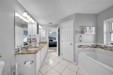 Stunningly Updated 4-Bedroom, 2-Bathroom WATERFRONT home located on Del Tura Golf and Country Club in Florida - for sale on GolfHomes.com, golf home, golf lot