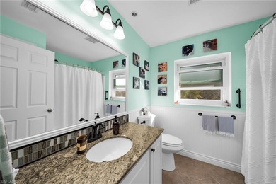 Stunningly Updated 4-Bedroom, 2-Bathroom WATERFRONT home located on Del Tura Golf and Country Club in Florida - for sale on GolfHomes.com, golf home, golf lot