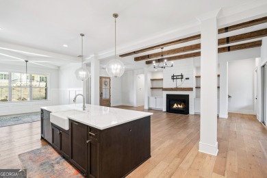 Welcome to this wonderfully modern farmhouse in the stunning on The Governors Towne Club in Georgia - for sale on GolfHomes.com, golf home, golf lot