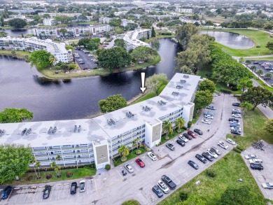 Recently renovated modern condo with new kitchen cabinets on Hillsboro Pines Golf in Florida - for sale on GolfHomes.com, golf home, golf lot