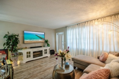 Recently renovated modern condo with new kitchen cabinets on Hillsboro Pines Golf in Florida - for sale on GolfHomes.com, golf home, golf lot