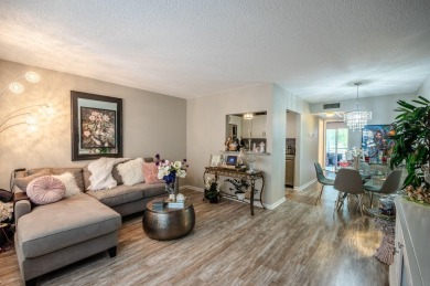 Recently renovated modern condo with new kitchen cabinets on Hillsboro Pines Golf in Florida - for sale on GolfHomes.com, golf home, golf lot