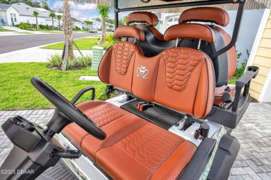 What goes with Lime? Coconut and a $15K 2024 Venom 4P EV Golf on LPGA International Golf Course in Florida - for sale on GolfHomes.com, golf home, golf lot