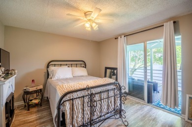Recently renovated modern condo with new kitchen cabinets on Hillsboro Pines Golf in Florida - for sale on GolfHomes.com, golf home, golf lot