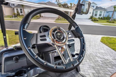 What goes with Lime? Coconut and a $15K 2024 Venom 4P EV Golf on LPGA International Golf Course in Florida - for sale on GolfHomes.com, golf home, golf lot