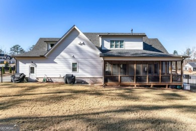 Welcome to this wonderfully modern farmhouse in the stunning on The Governors Towne Club in Georgia - for sale on GolfHomes.com, golf home, golf lot