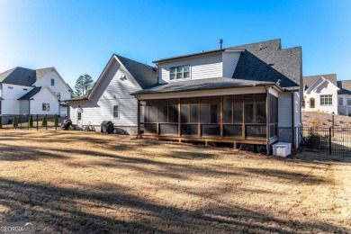 Welcome to this wonderfully modern farmhouse in the stunning on The Governors Towne Club in Georgia - for sale on GolfHomes.com, golf home, golf lot