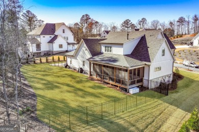 Welcome to this wonderfully modern farmhouse in the stunning on The Governors Towne Club in Georgia - for sale on GolfHomes.com, golf home, golf lot
