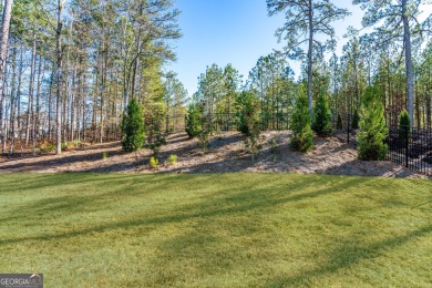 Welcome to this wonderfully modern farmhouse in the stunning on The Governors Towne Club in Georgia - for sale on GolfHomes.com, golf home, golf lot