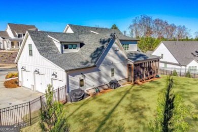 Welcome to this wonderfully modern farmhouse in the stunning on The Governors Towne Club in Georgia - for sale on GolfHomes.com, golf home, golf lot