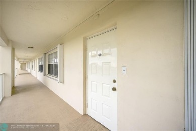 Enjoy resort-style living in this quaint 2-bedroom, 2-bathroom on Palm-Aire Country Club and Resort - The Oaks in Florida - for sale on GolfHomes.com, golf home, golf lot