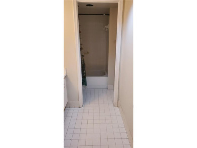 PRICED TO SELL HANDYMAN SPECIAL! 1 BED, 1 BATH PENTHOUSE CONDO on Wynmoor Golf Course in Florida - for sale on GolfHomes.com, golf home, golf lot