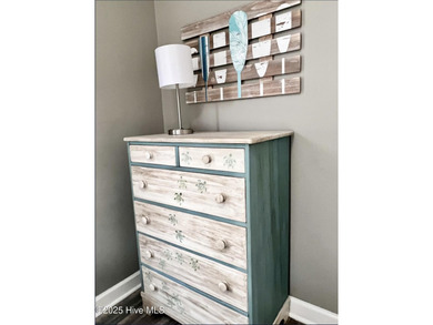 This CHARMING 2 Bedroom, 2 Bath cottage is the perfect Oak on Founders Club At St. James Plantation in North Carolina - for sale on GolfHomes.com, golf home, golf lot