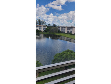 PRICED TO SELL HANDYMAN SPECIAL! 1 BED, 1 BATH PENTHOUSE CONDO on Wynmoor Golf Course in Florida - for sale on GolfHomes.com, golf home, golf lot