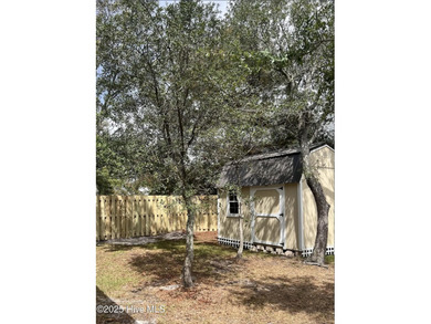This CHARMING 2 Bedroom, 2 Bath cottage is the perfect Oak on Founders Club At St. James Plantation in North Carolina - for sale on GolfHomes.com, golf home, golf lot