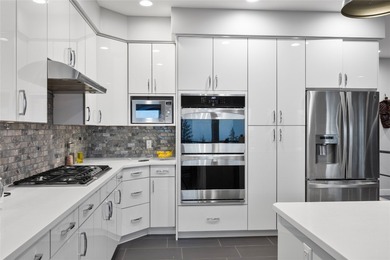 Welcome to this stunning contemporary walk-out rancher nestled on  in  - for sale on GolfHomes.com, golf home, golf lot