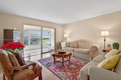 Best priced, largest golf course facing 2/2 condo in Century on  in Florida - for sale on GolfHomes.com, golf home, golf lot